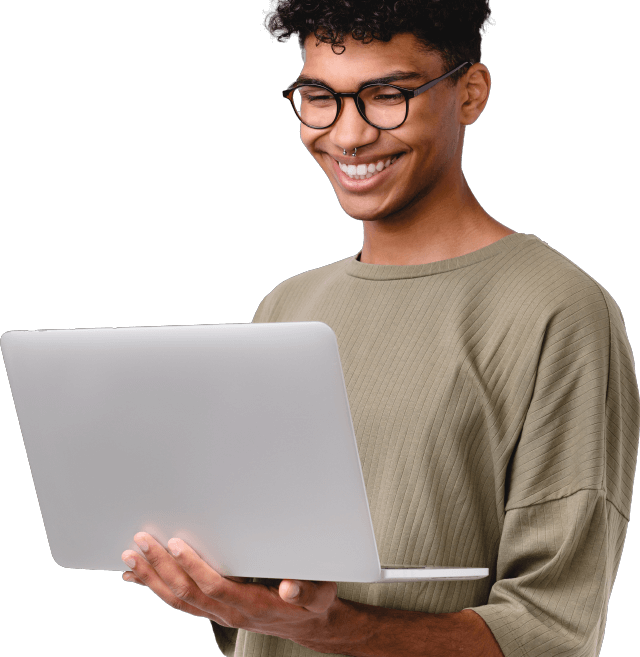 Young man holding laptop